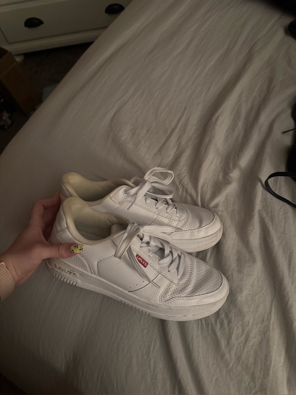 White Levi tennis shoes